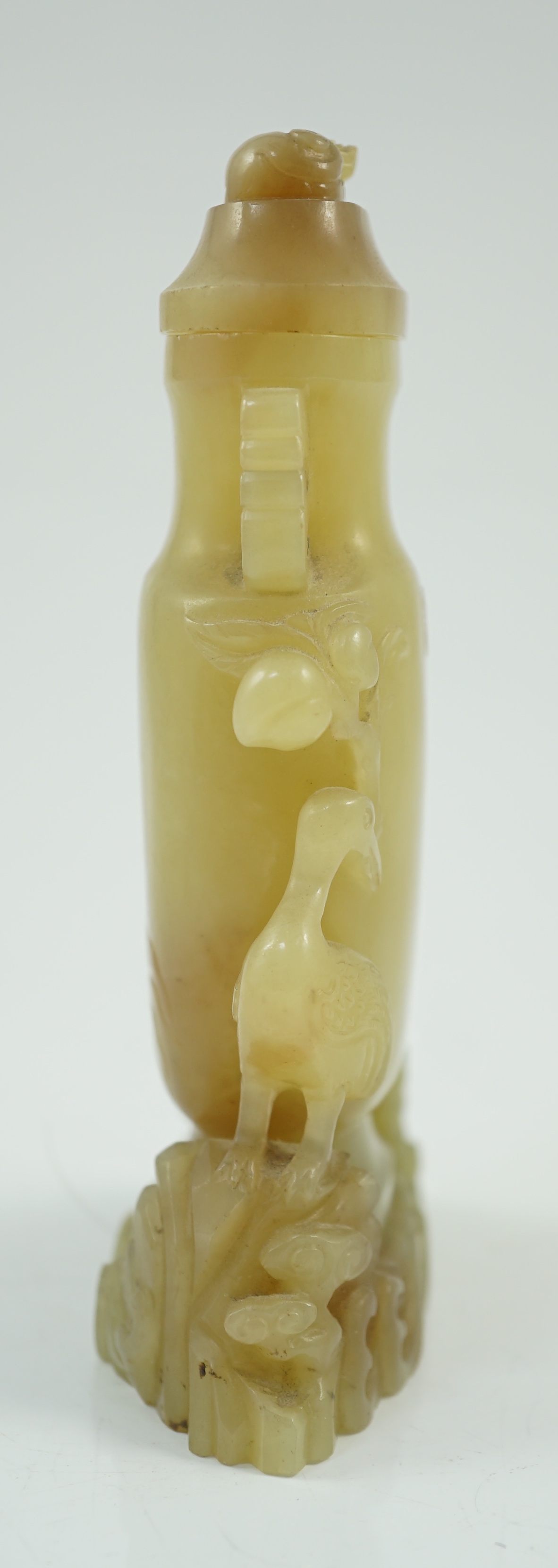 A Chinese yellow and russet jade vase and cover, 19th/20th century